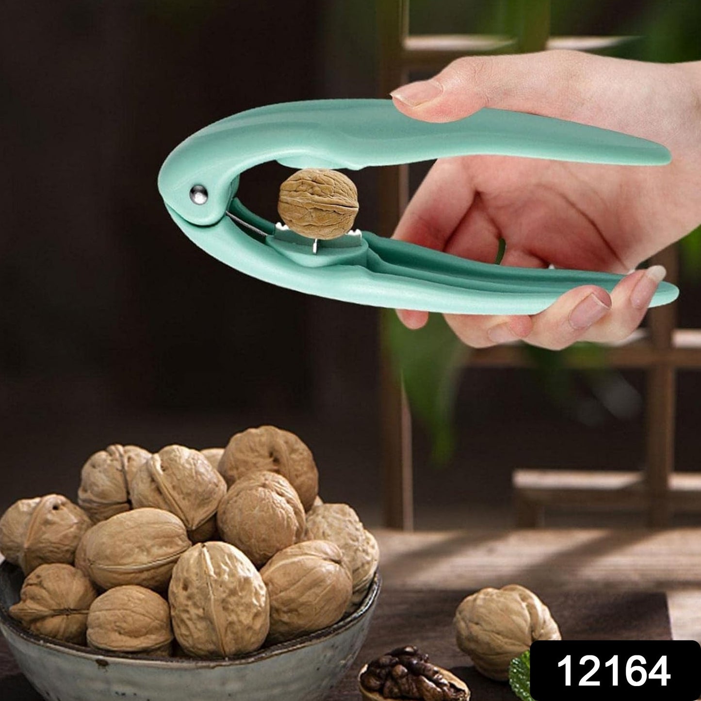 Close-up of chestnut snapper nutcracker showing sawtooth design for stronger grip.