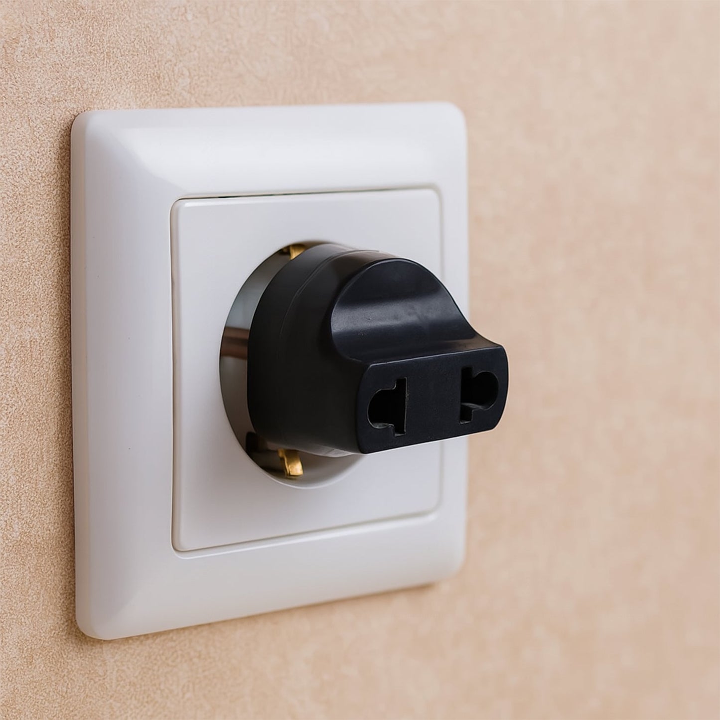 2 Pin Plug Adapter for universal to Indian sockets, shown in its color box packaging.