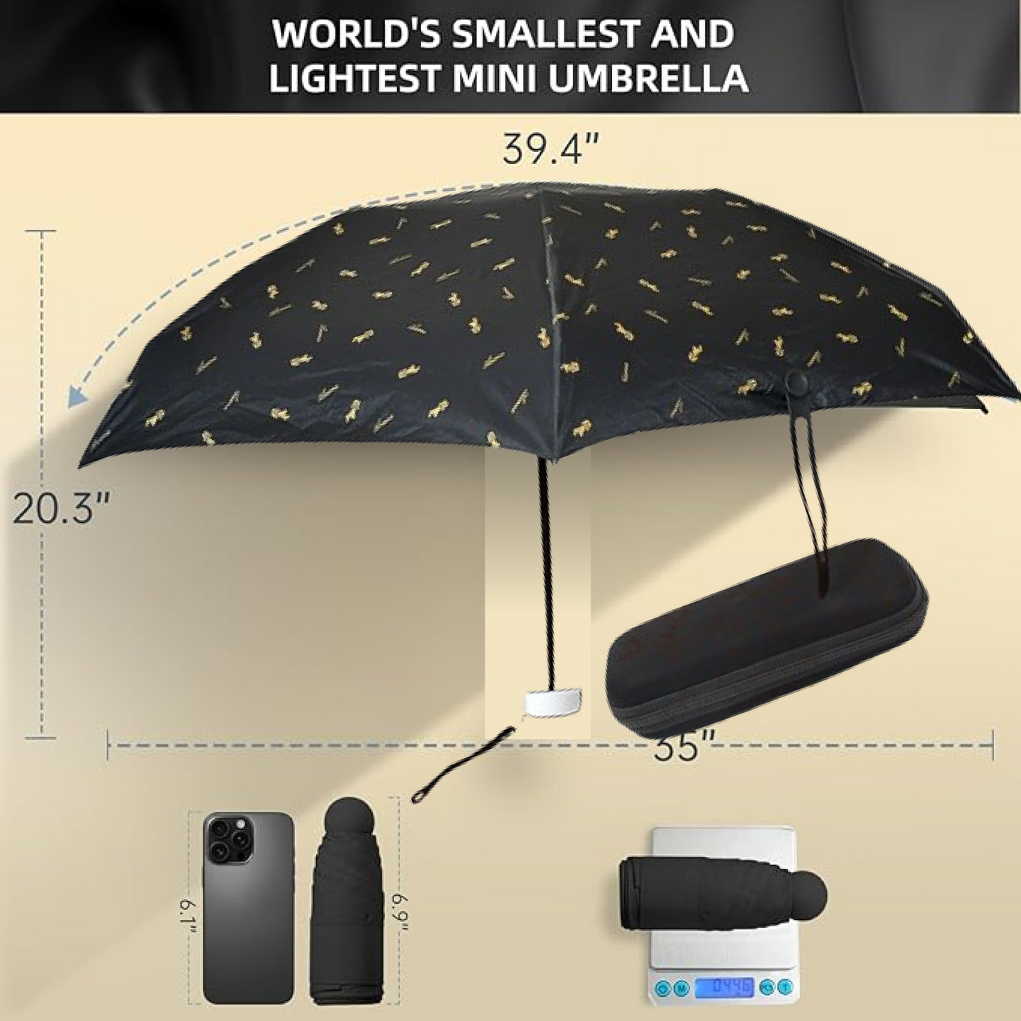 The black umbrella is shown open with dimensions, alongside a phone and the folded umbrella on a scale.
