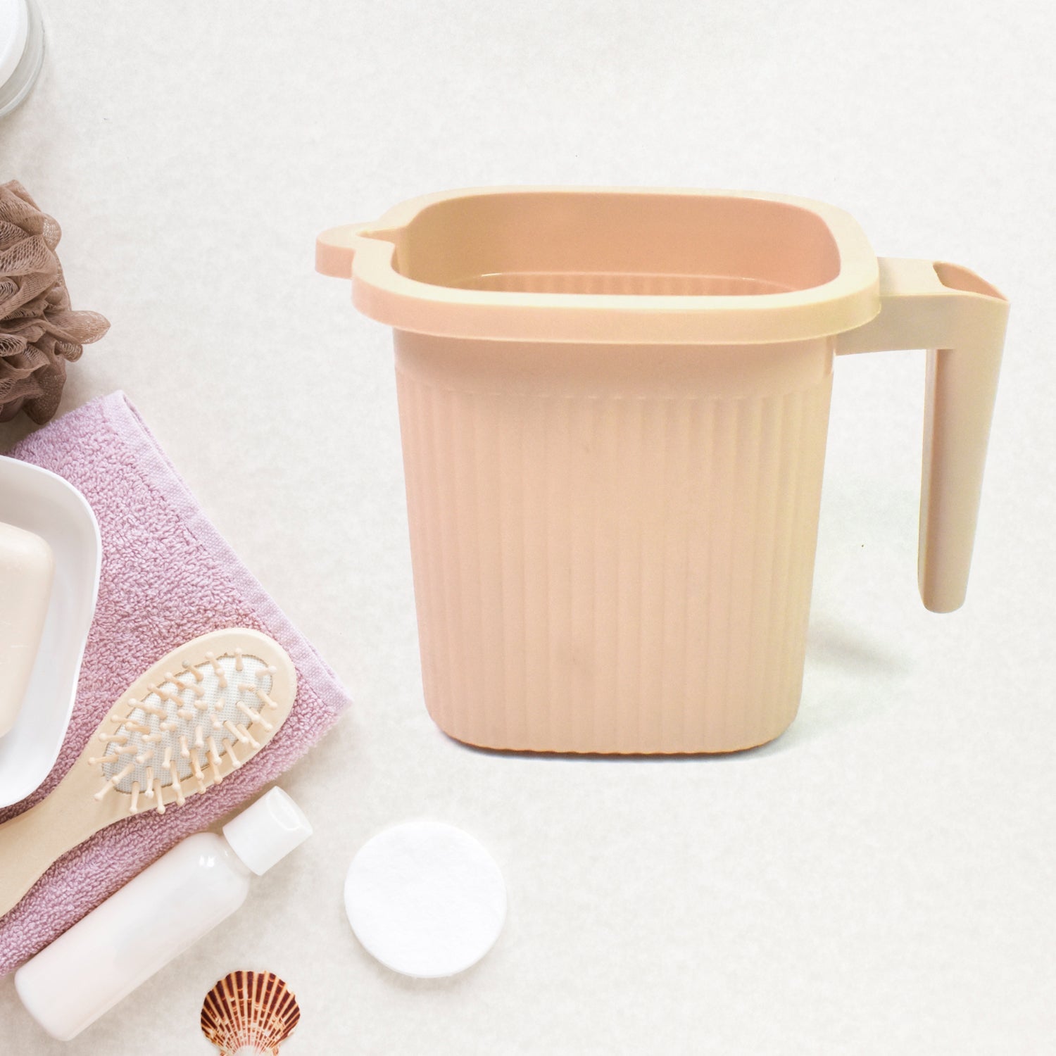 Clear Plastic Bath Mug on a plain background, highlighting its simple, functional design.