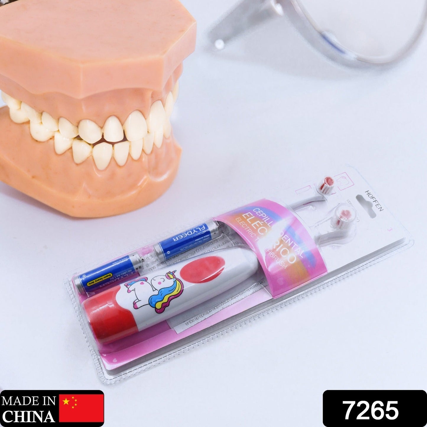 Travel electric toothbrush for adults and kids, shown with replacement head.