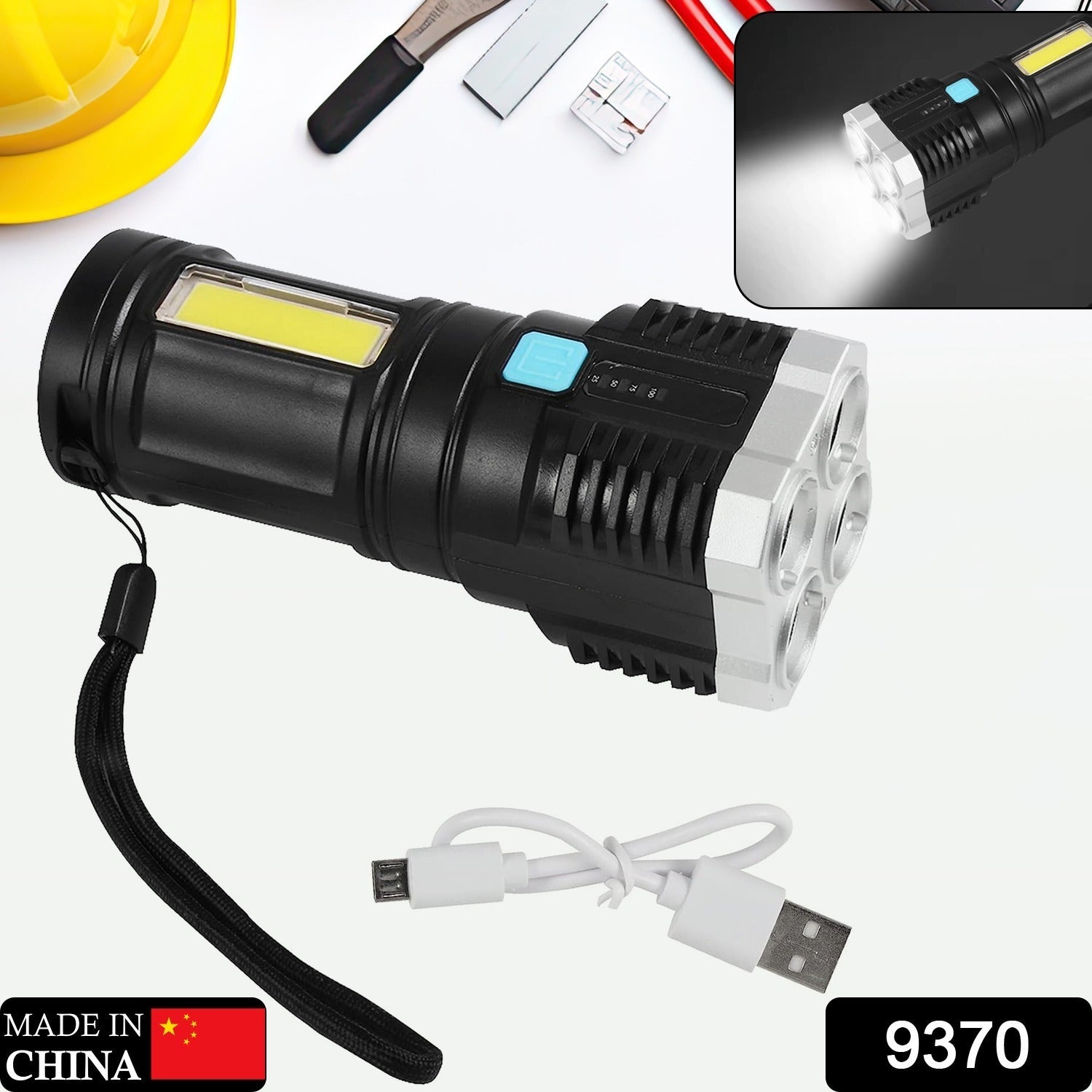 A black and silver flashlight with a wrist strap and a white USB charging cable on a white background with tools.
