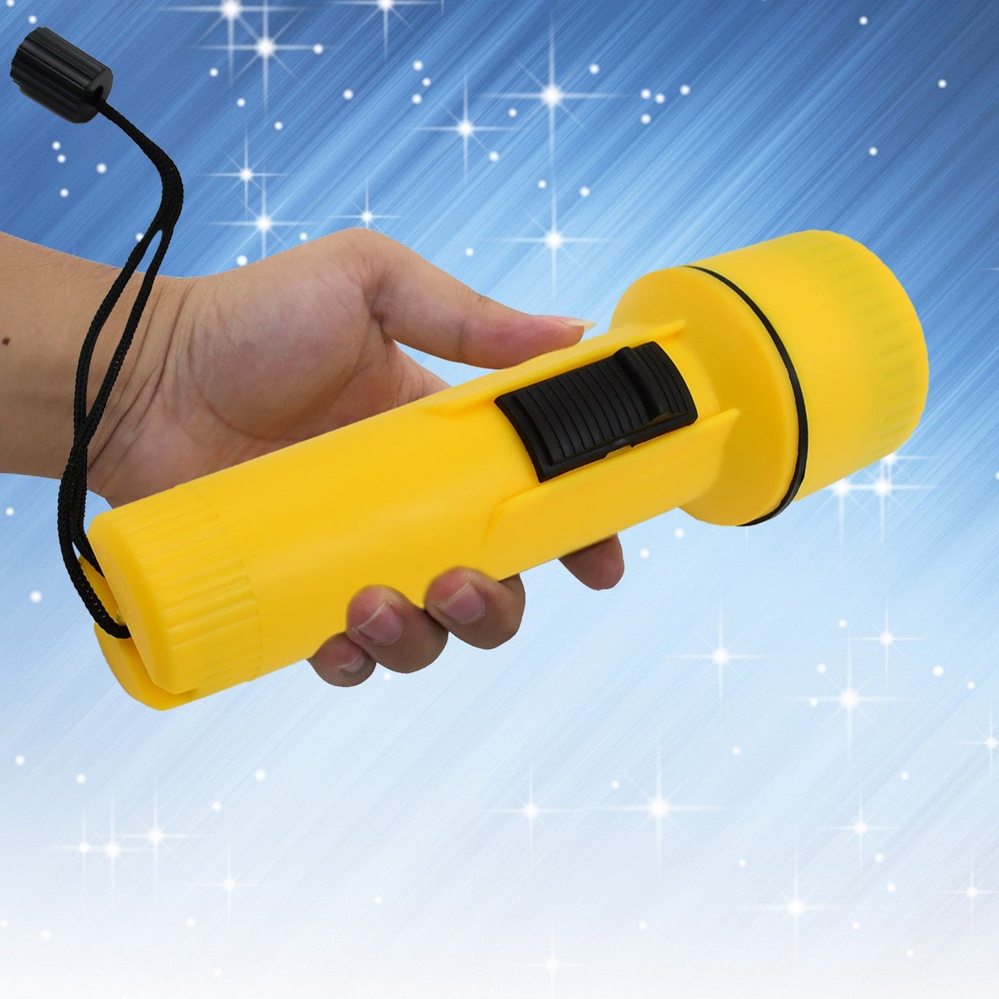 A hand holds a yellow plastic torch with a black wrist strap against a bright blue and white background.