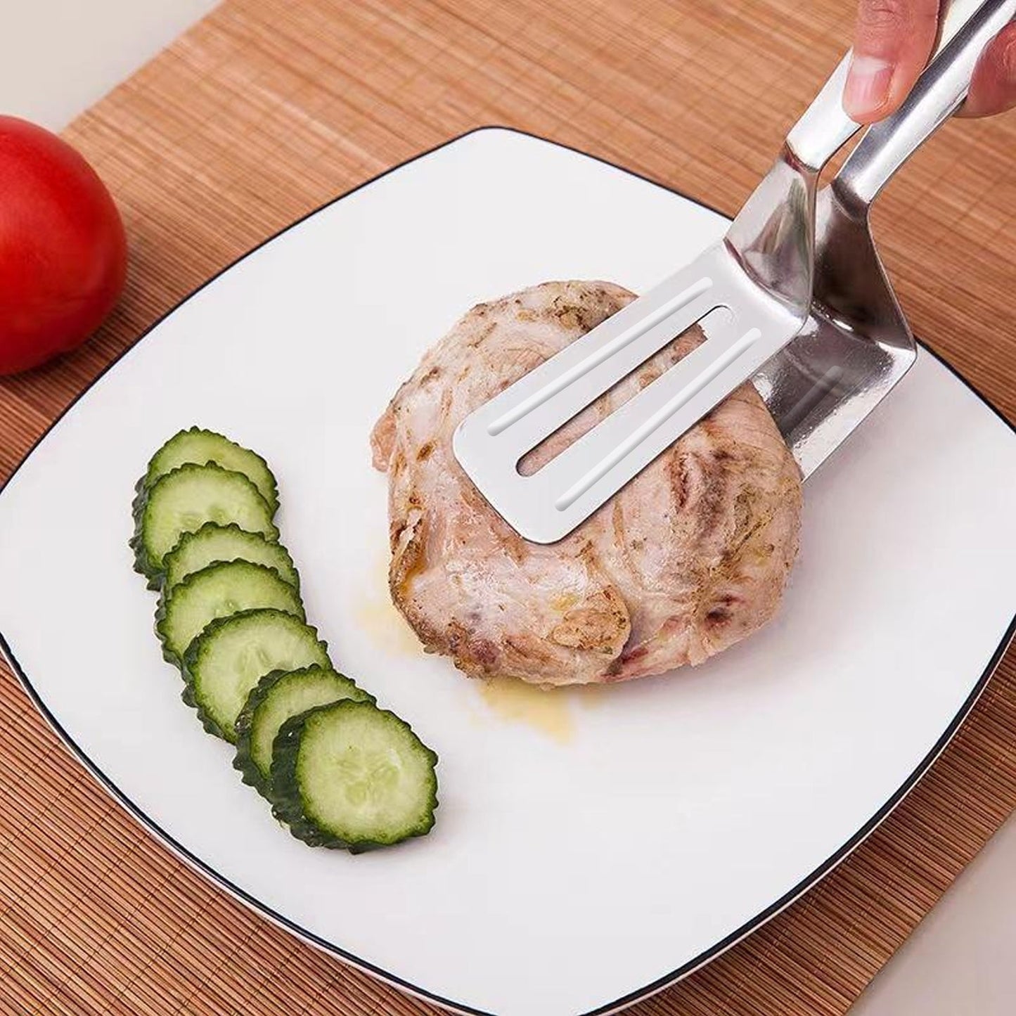 Stainless steel cooking tongs, ideal for grilling and kitchen use