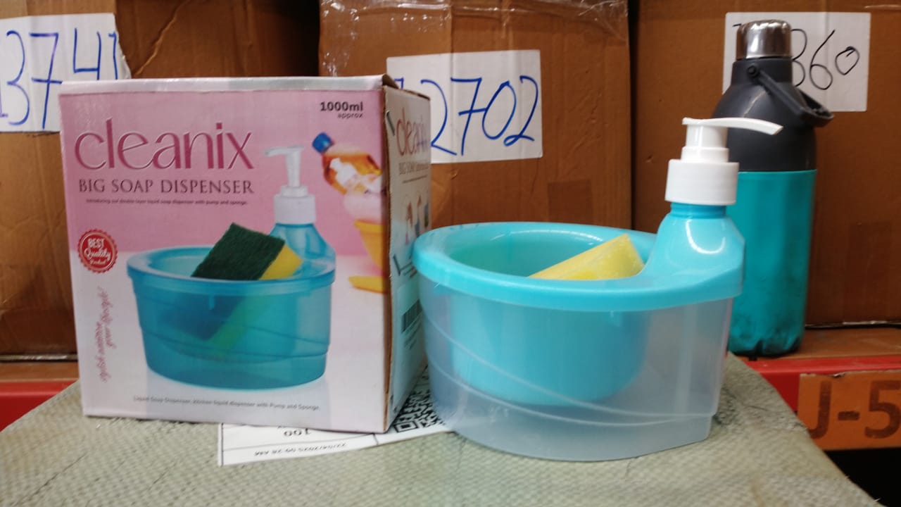 Modern 2-in-1 soap dispenser with sponge holder enhancing a contemporary kitchen.