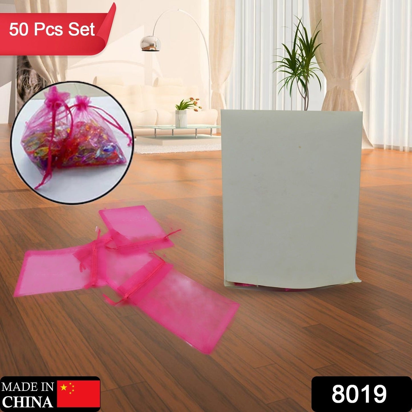 Multiple empty organza drawstring pouches laid flat, highlighting their delicate mesh texture.