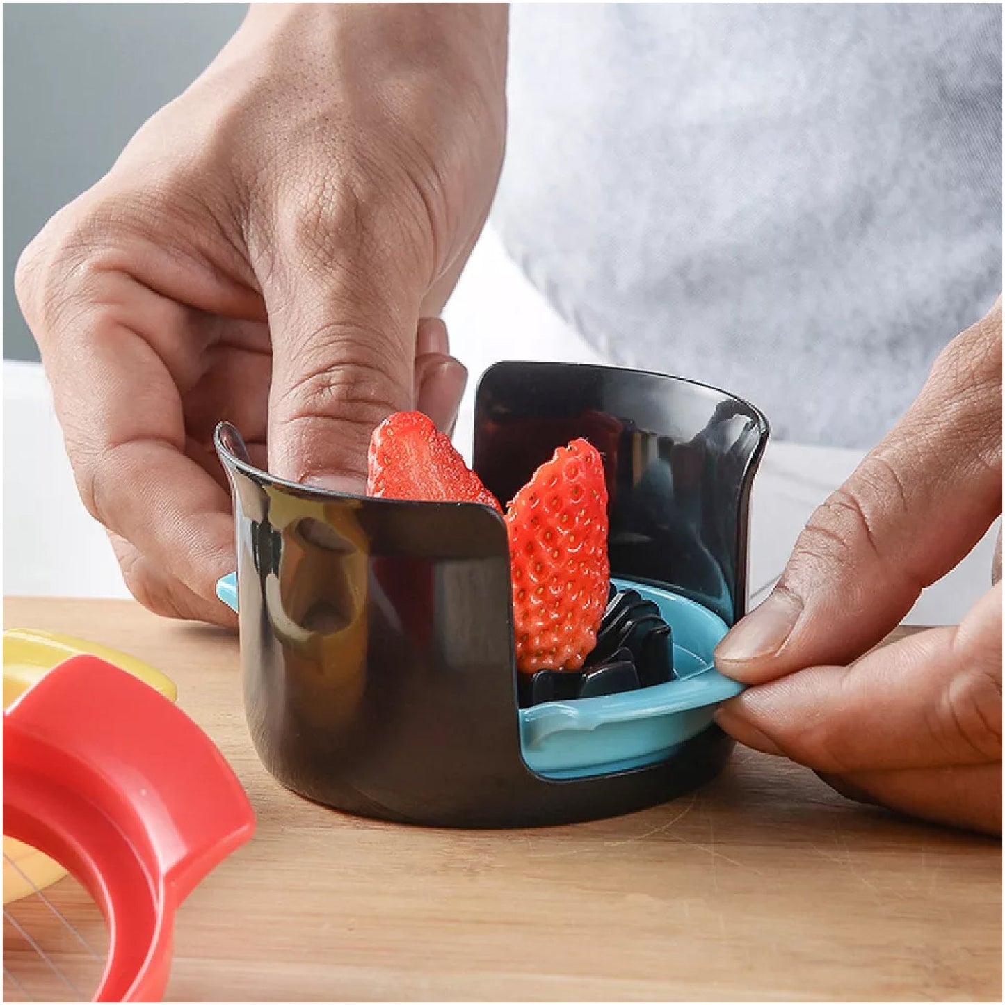 Multifunctional slicer in action, creating perfect slices of a hard-boiled egg.