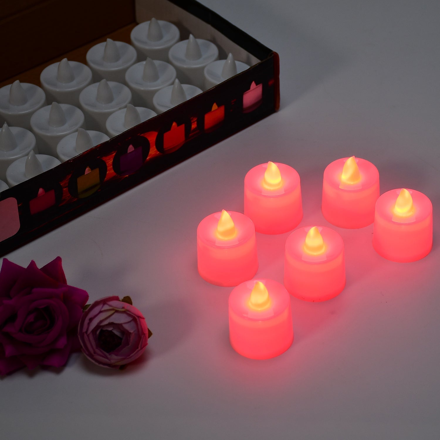 Full pack of 24 red LED tealight candles, ready for any celebration.