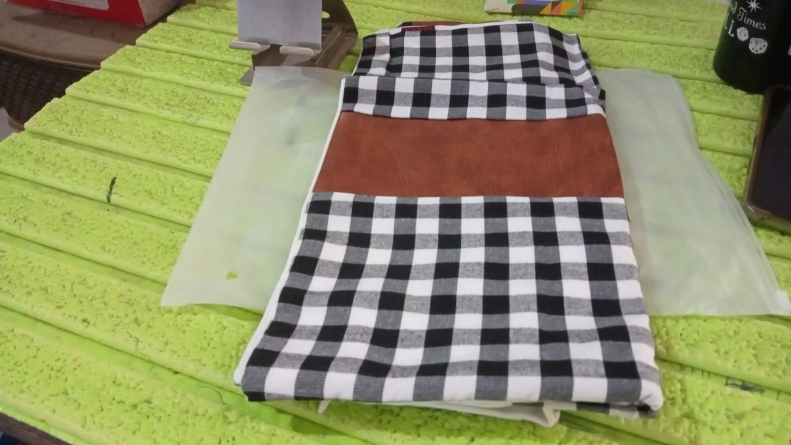 Versatile faux leather and cotton blend pillow cover adding comfort.