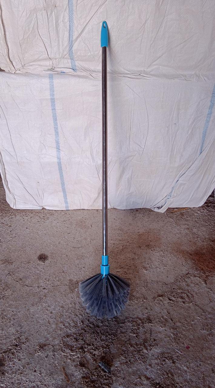The versatile cobweb cleaning brush shown ready for various household dusting tasks.