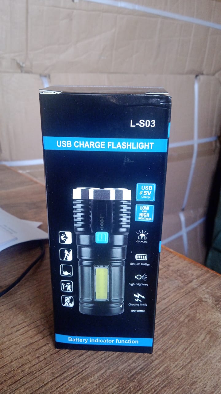 A black box for a USB charge flashlight, featuring an image of the flashlight and various product specifications.