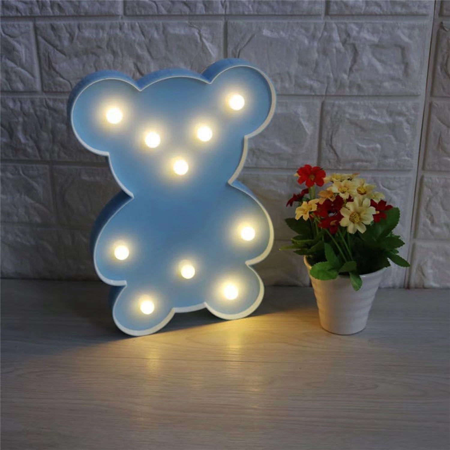 Portable teddy bear LED night lamp with cordless battery operation for easy placement