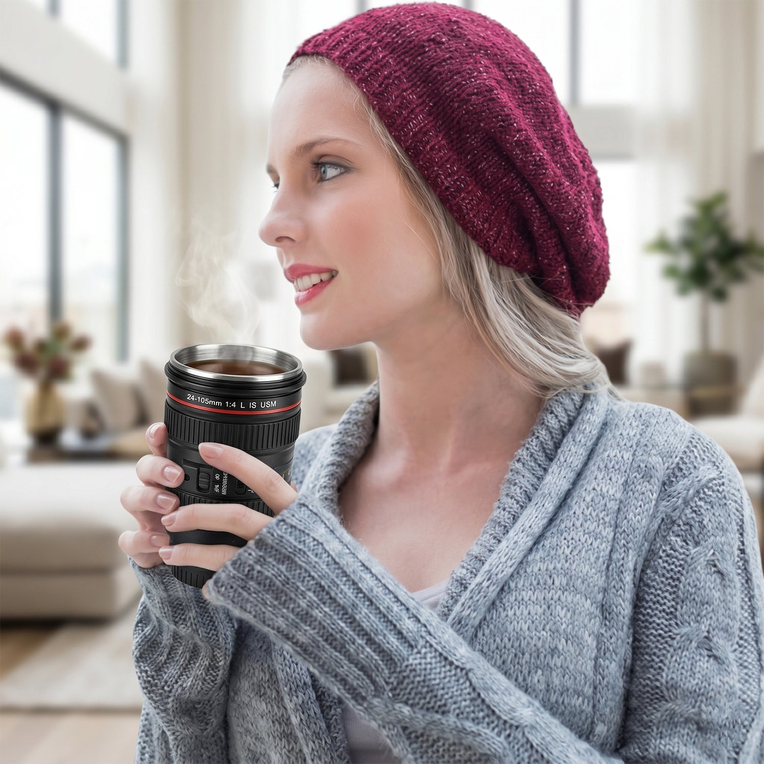Camera lens coffee mug with its lid off, revealing the stainless steel interior.