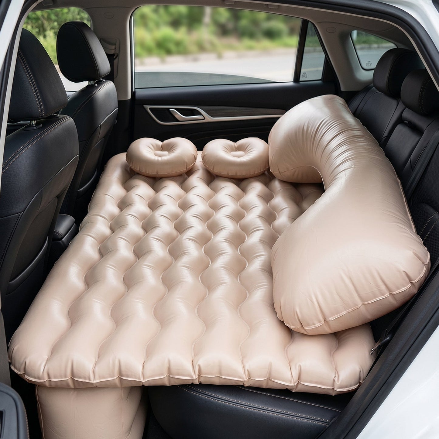 Complete car air mattress set featuring pillows and electric pump for travel.
