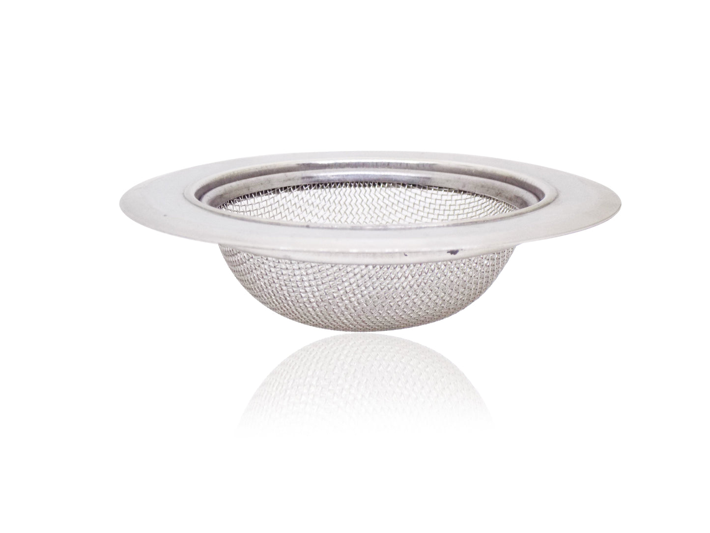 Stainless steel sink strainer effectively catching food particles in a kitchen wash basin drain.