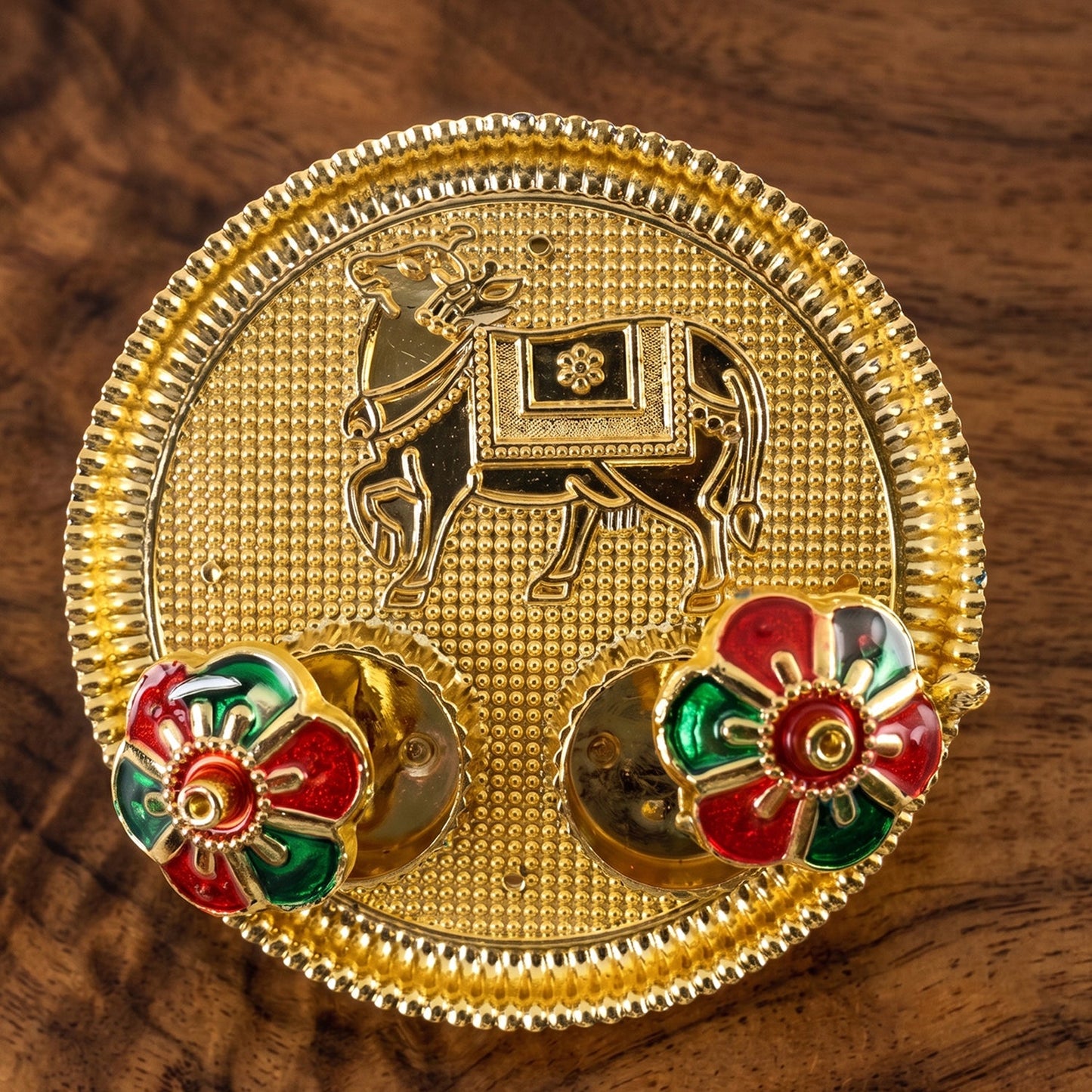Ornate cow shaped kumkum holder for festivals and worship