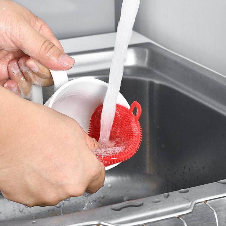 Close-up of a mildew-resistant silicone dish scrubber for hygienic cleaning.