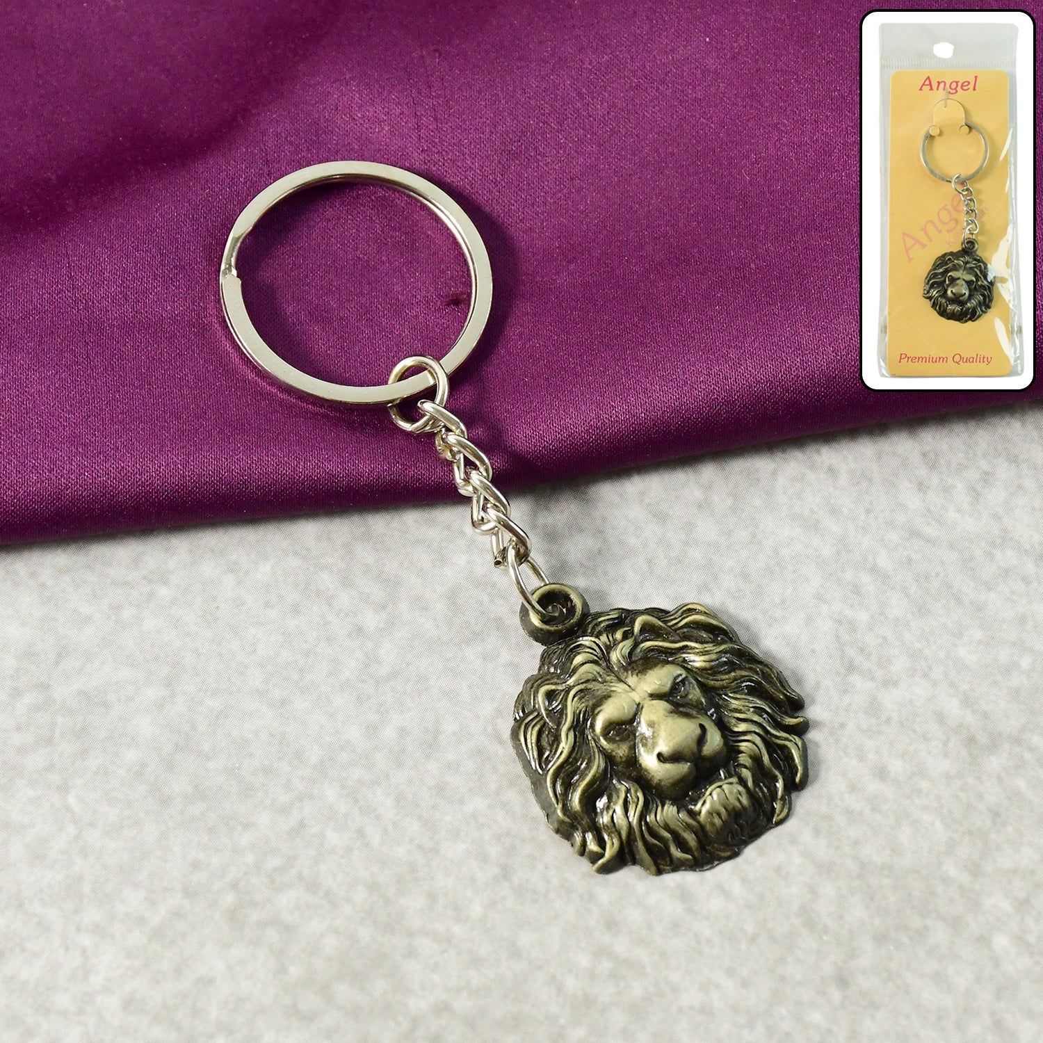 Front view of lion head metal keychain showcasing intricate design