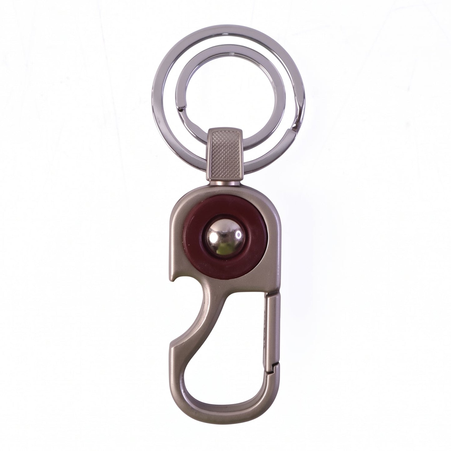 Modern design metal key holder that clips easily onto belts and bags.