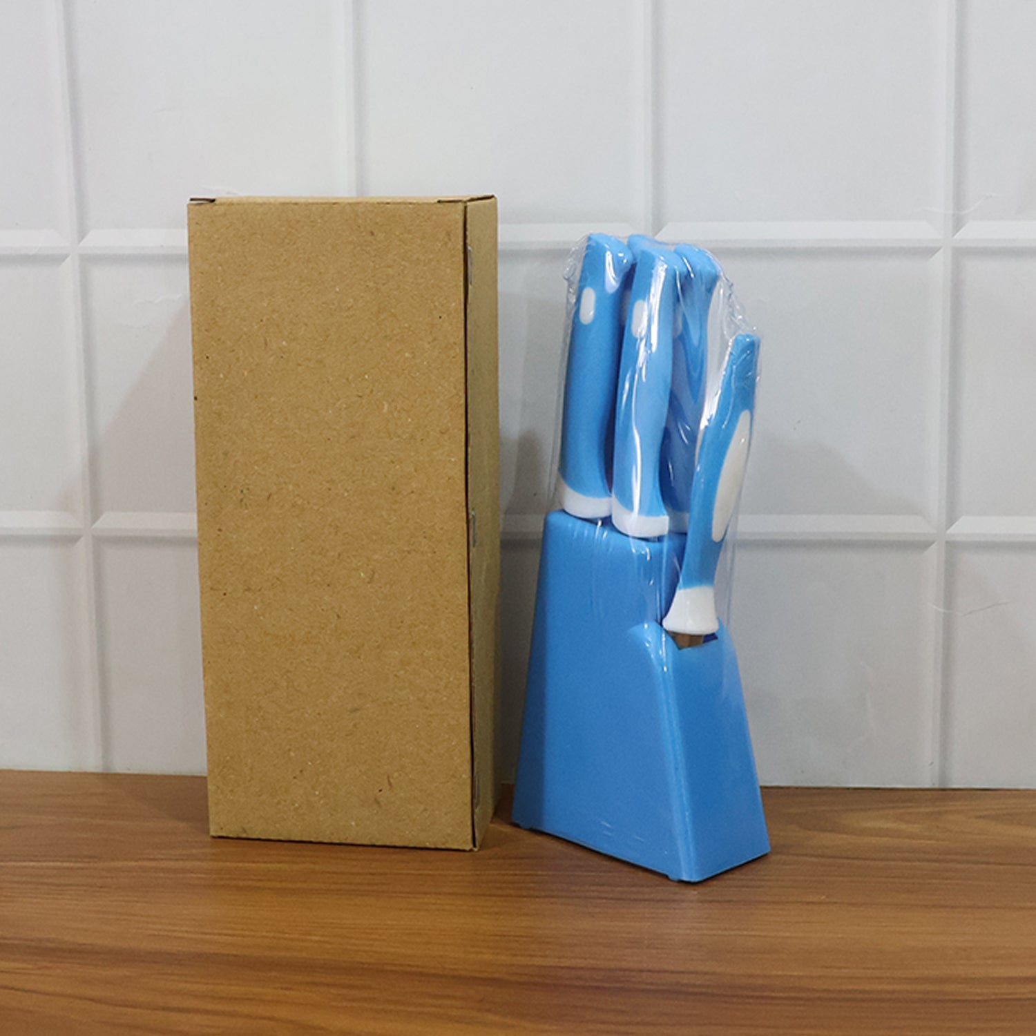 All components of the Stainless Steel Knife Set and peeler neatly arranged.