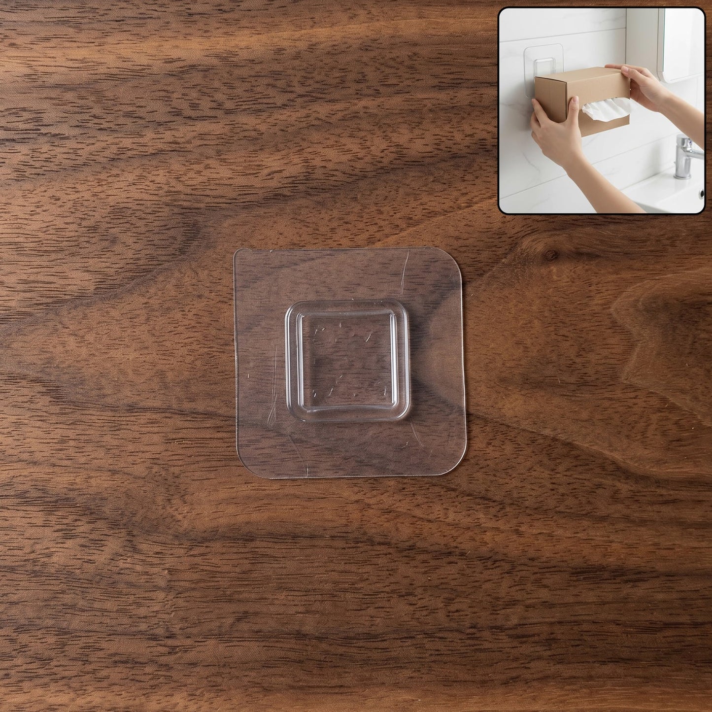 Clear self-adhesive wall hook for easy, tool-free mounting on smooth surfaces.