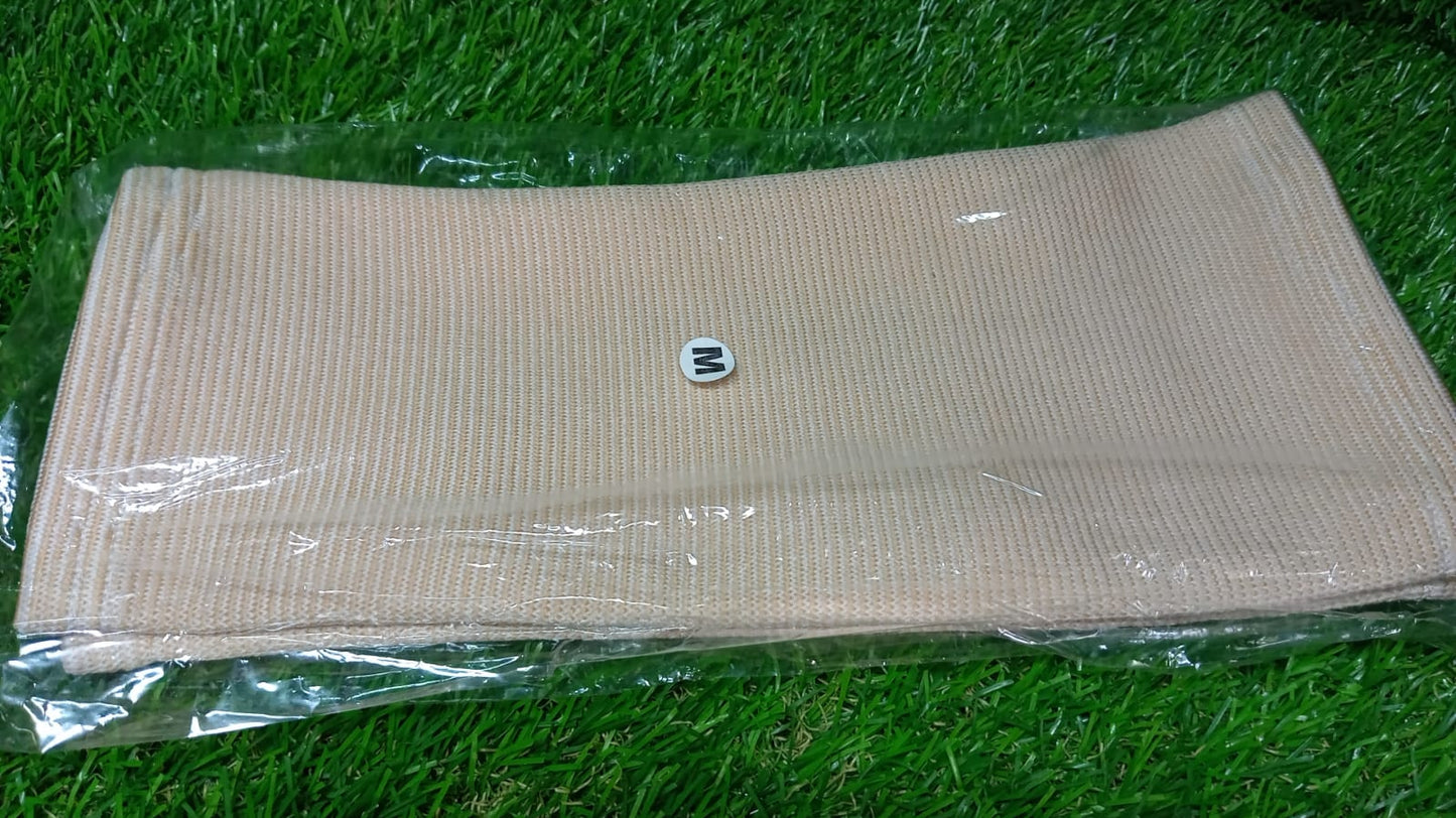 Person wearing a medium knee support cap under clothing for discreet support.