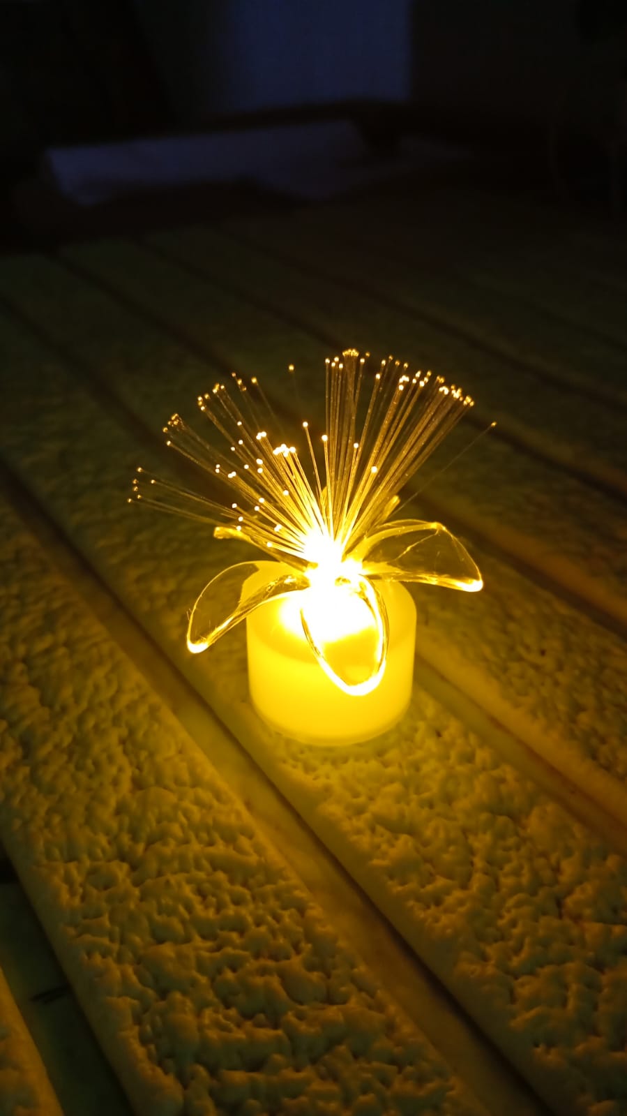 Several fiber optic LED centerpieces scattered for event lighting.