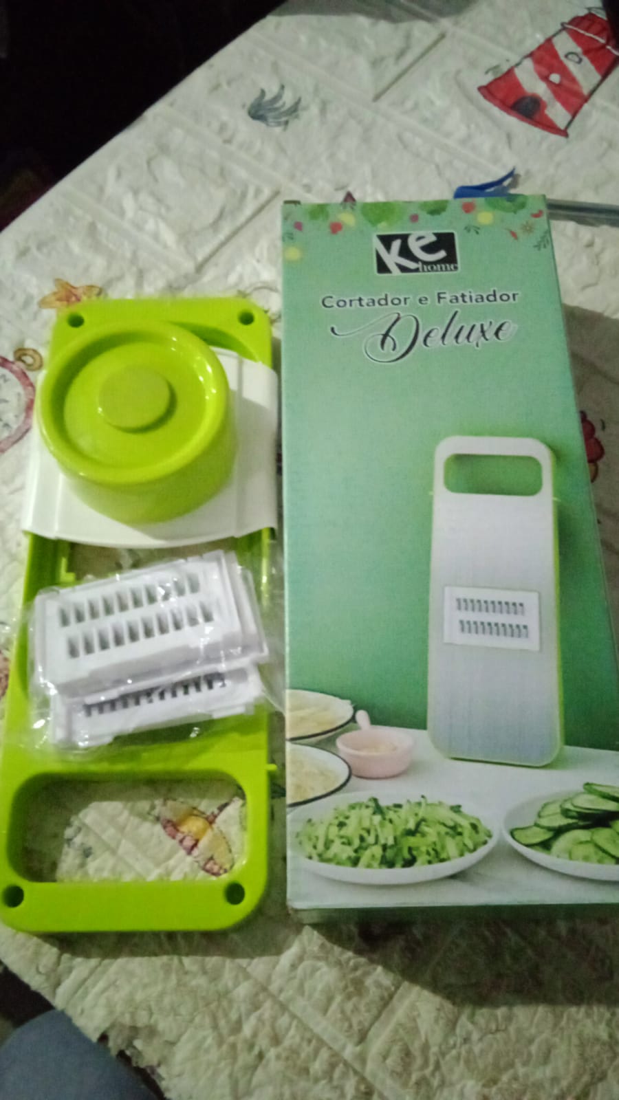 Freshly prepared vegetables, sliced and grated, ready for cooking with the versatile tool.