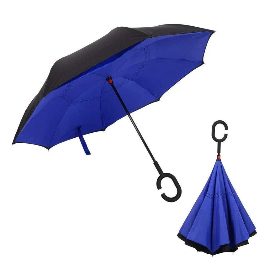 An open black and blue umbrella with a C-shaped handle, and a closed matching umbrella hanging by its handle.