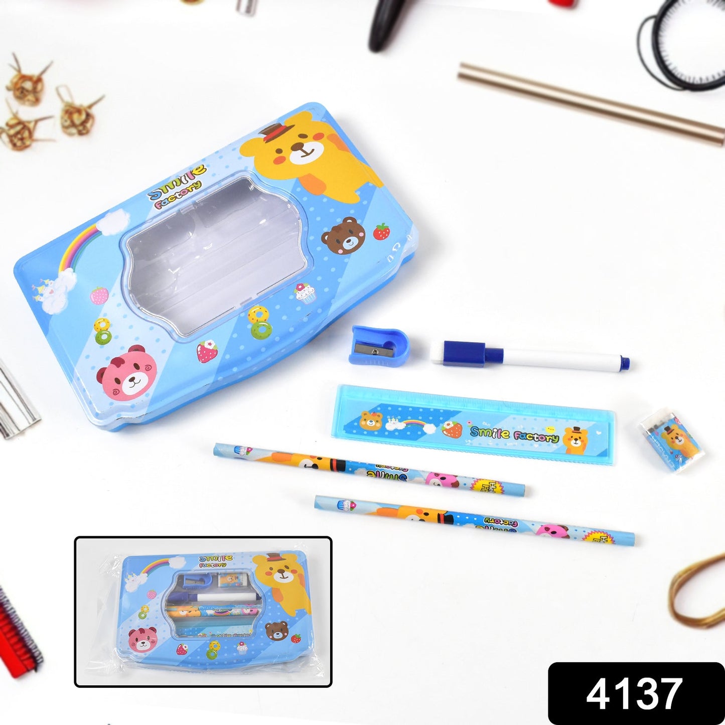 Open Kids Metal Compass Box displaying a pencil, eraser, sharpener, scale, and marker.
