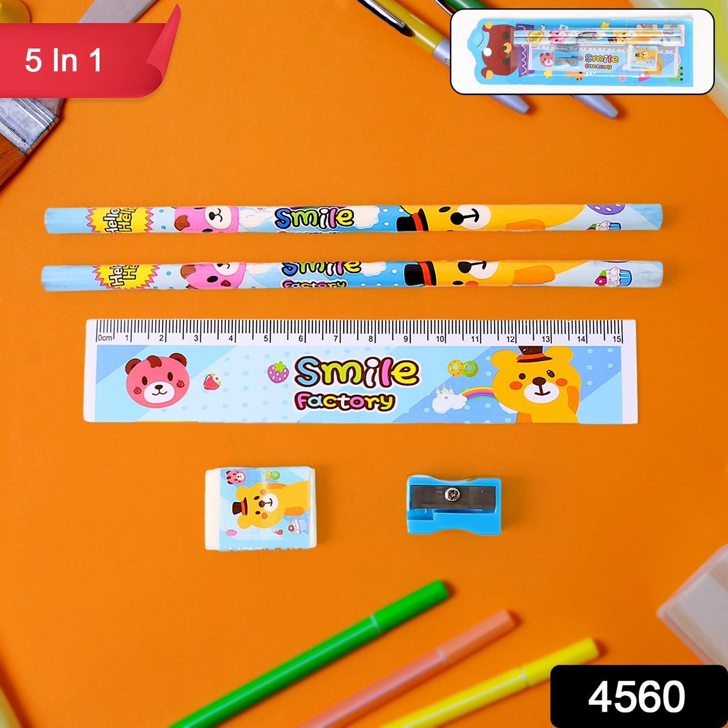 Close-up of a wooden pencil, ruler, and sharpener with playful prints.
